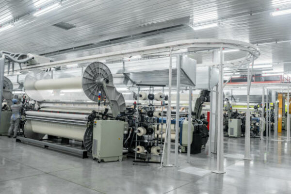 Machine and equipment in the weaving shop, a general overview. interior of industrial textile factory