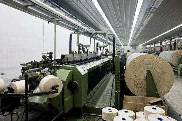 textile looms making denim fabric.